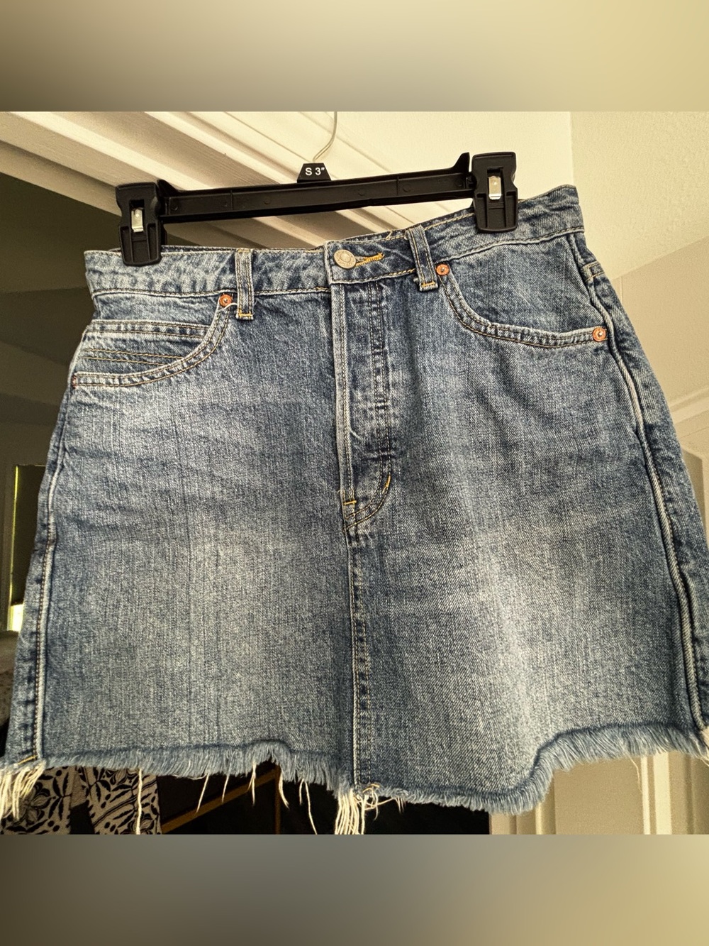 We The Free Washed Blue Denim Mini Skirt with Frayed Hem
